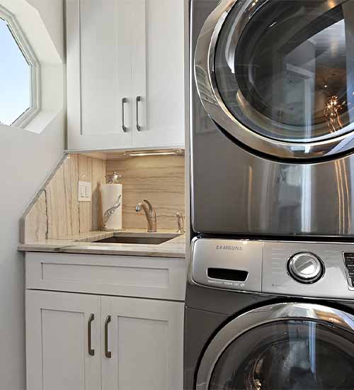 Monterey Laundry Cabinets with Pearl Opaque